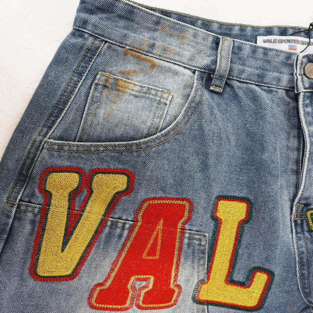 VALLEY Distressed Appliqué Cargo Jeans — detail