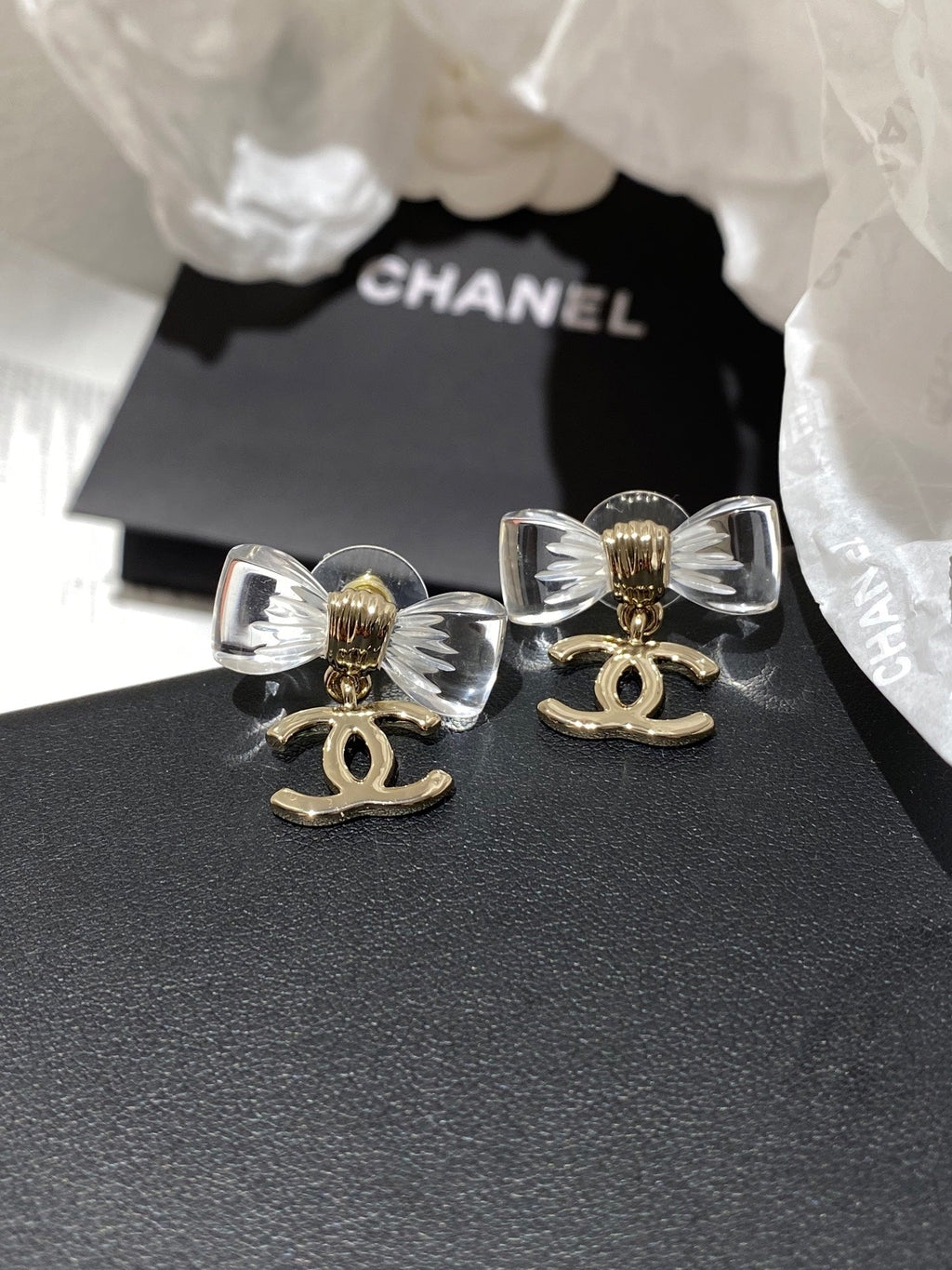 Chanel Transparent Acrylic Bow Gold Earrings