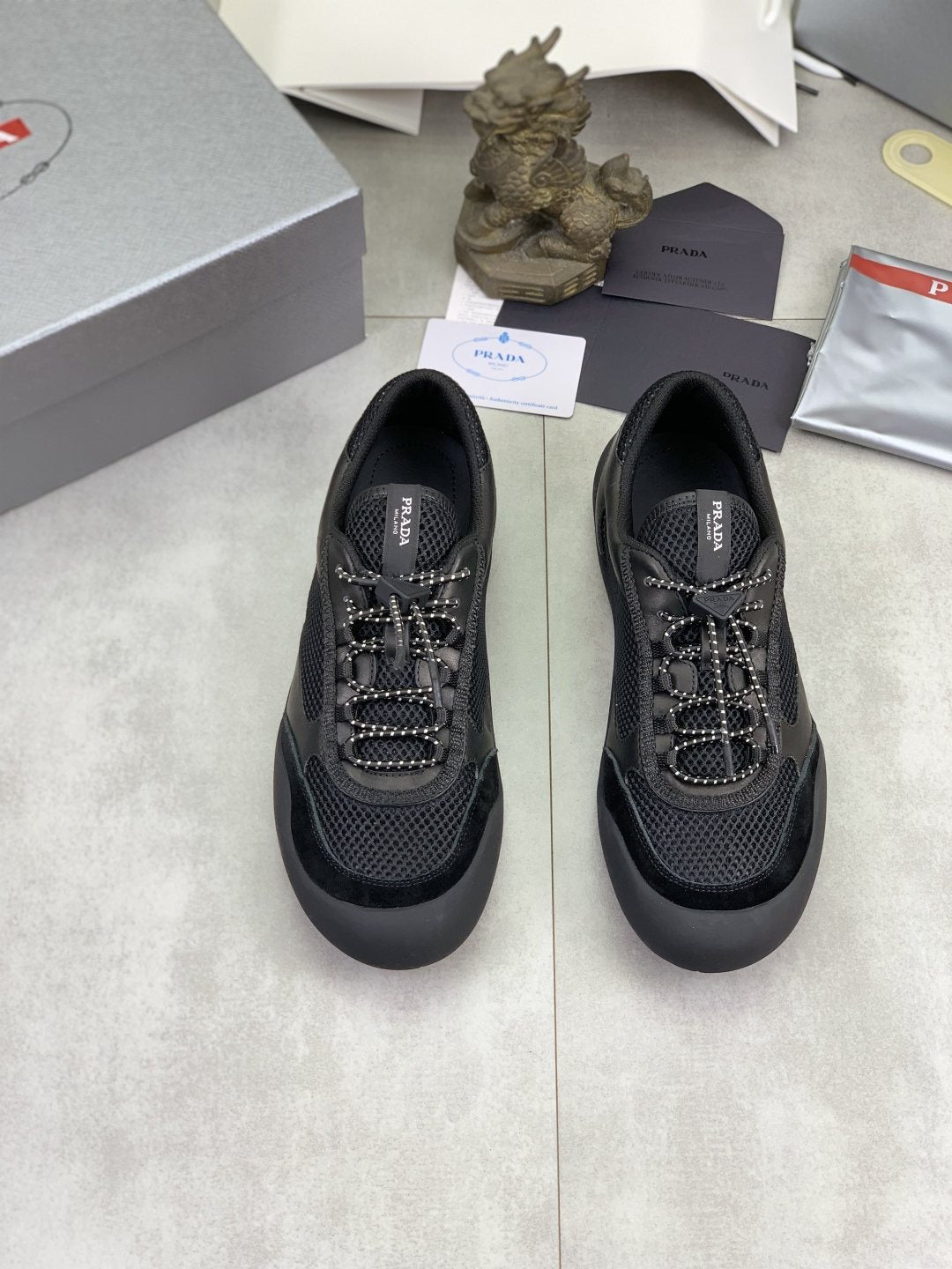 Prada Paneled Low-Top Sneakers — hero