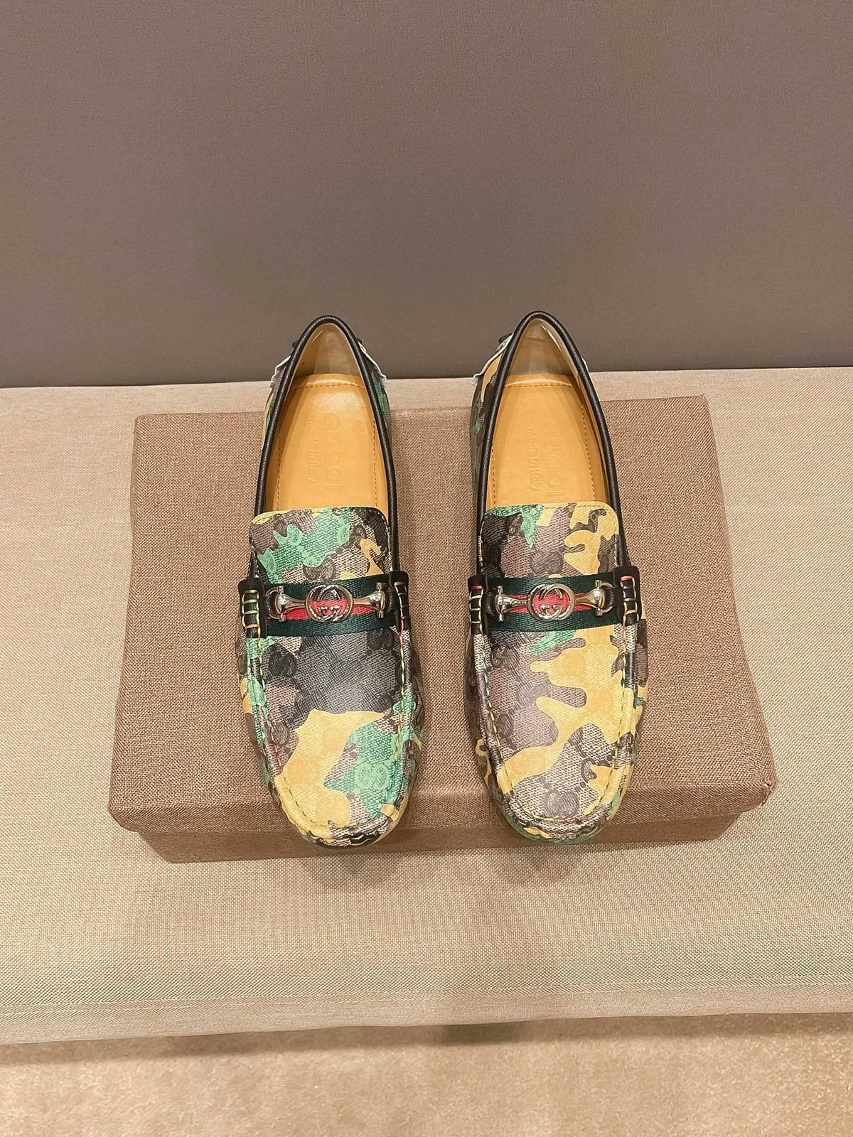 Gucci Patterned Metal-Accent Loafers — hero