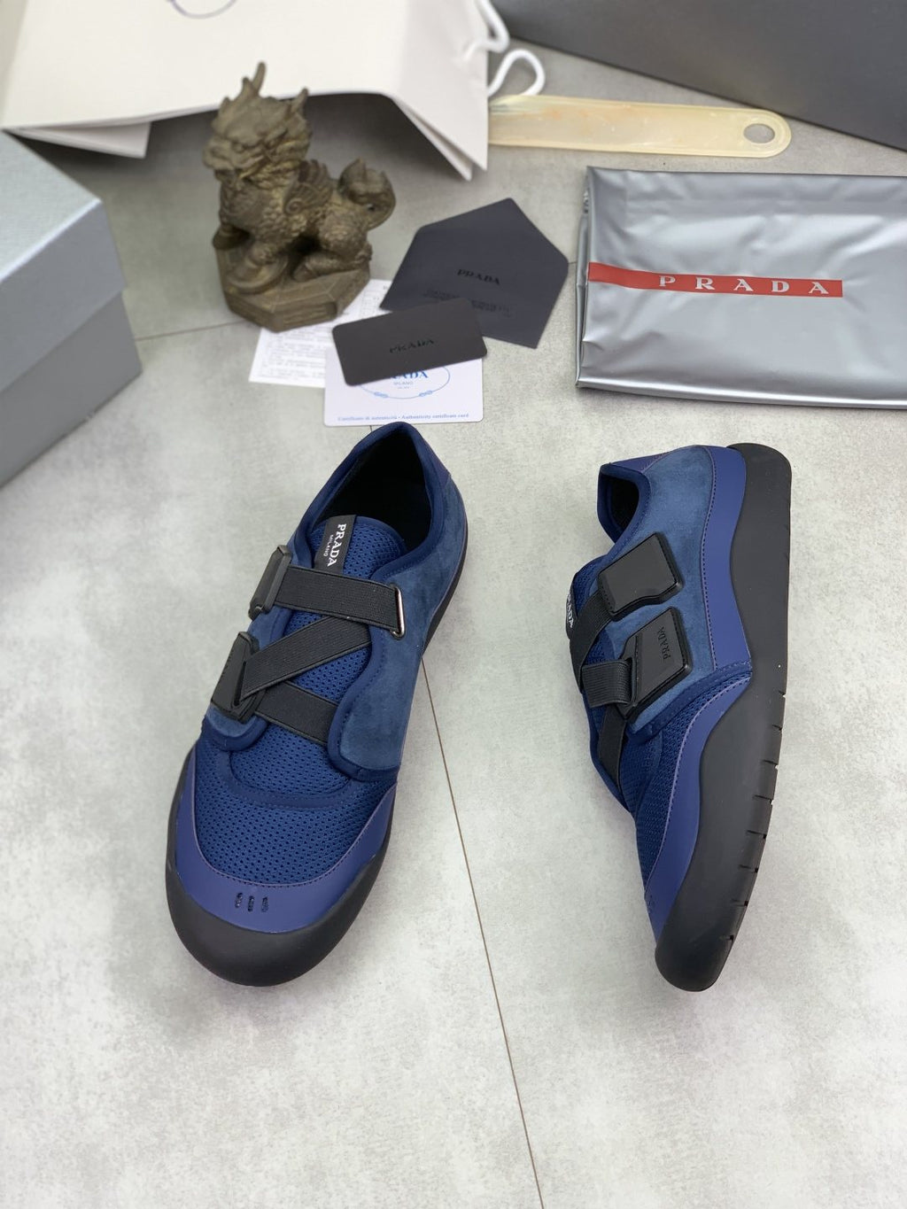 Prada Cross-Strap Low-Top Sneakers — front